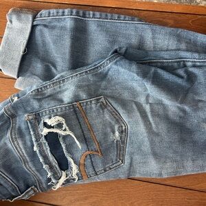 Distressed Blue Jeans
